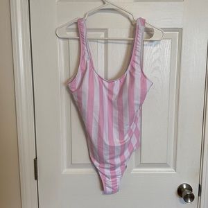 Pink and white striped one piece bathing suit. Size L.